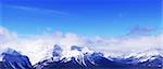 Snowy mountain ridges at Lake Louise ski resort in Canadian Rockies, panoramic view