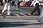 Pedestrians crossing a street of big city. Special toned and motion-blur foto f/x