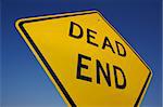 Abstract View of Dead End Sign with Blue Sky
