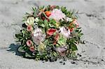 Wedding bouquet in the sand
