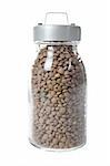 Glass jar of tasty and fresh lentils isolated on white background