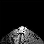 Close up of a football in black and white.