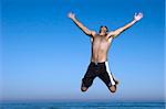 Man jumping on the beach