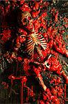 Halloween image / background of blood, bones and guts.  Sculpture was built by me from a plastic skeleton, so I hold any copyrights.