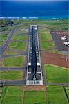 Aerial view of Maui, Hawaii airport with Pacific ocean.