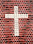 Red Brick Cross on the Side of a Church