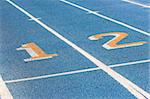 Blue racetrack with lines and numbers