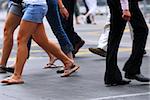 People walking on a busy street in the city center