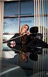 business woman indoor shot sitting at her desk