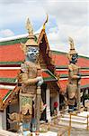 Guardian statues in Emerald buddha temple in Bangkok thailand