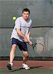 Young man playing tennis