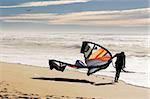 kite surfer on the beach at santa cruz, california