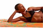 African-American female relaxing and taking sunbath (isolated)