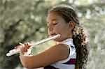 Girl playing a flute