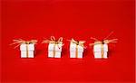 White gift boxes tied with raffia