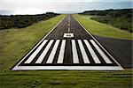 Aerial view of paved airplane runway on Maui, Hawaii.