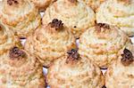 Background view of coconut cookies arranged in checkerboard order.