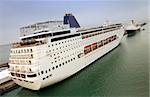 Luxury cruise liner docked at pier
