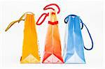 Christmas colorful paper bags on white