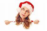 Girl in Santa's hat with a signboard, isolated on white