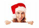 Girl in Santa's hat with a signboard, isolated on white