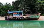 Old fishing boat moored on Phuket Island, Thailand.