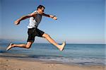 Man jumping on the beach