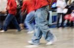 Pedestrians moving at the street of big city. Special motion blur effect.