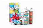 Assortment of gift boxes, reflected on white background