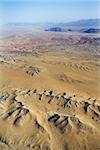 Aerial view of mountainous  desert landscape.