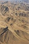 Aerial view of desert mountains.