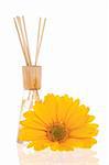 Fragrance sticks and yellow daisy