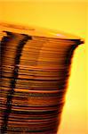 Stack of Cds on yellow background