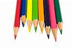 Assortment of coloured pencils with shadow on white background