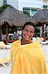 Young Adult Woman Wrapped in a Towel After Getting Wet