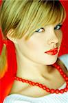 Portrait of attractive beautiful young sexy woman red necklace