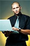 A businessman using laptop computer