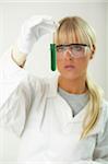 Female lab worker testing and experimenting