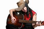 A woman playing country and western music on a guitar