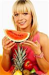 Happy beautiful women with fresh fruits and holding watermelon