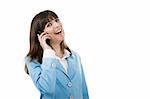 A happy businesswoman holding a phone and talking