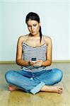 Young woman using by cell phone