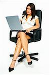 Sexy Business women using laptop computer sitting on office chair