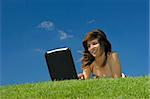 Woman in outdoor study with a laptop