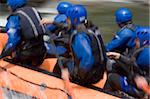 Whitewater rafting on a mountain river. With tripod and long exposure time - motion blurred.