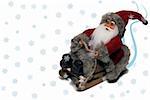 Santa claus on his sledge with snow