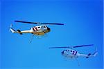 Helicopter making water drops for the firemen on the ground battling California wildfires in Los Angeles.