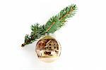 Hand-painted ball on fir-tree branch as Christmas decoration