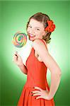 girl in red with a rainbow lollipop