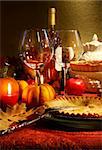 Table elegantly set with wine  for Thanksgiving